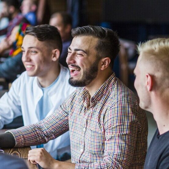 group-male-friends-enjoying-restaurant_23-2147861883